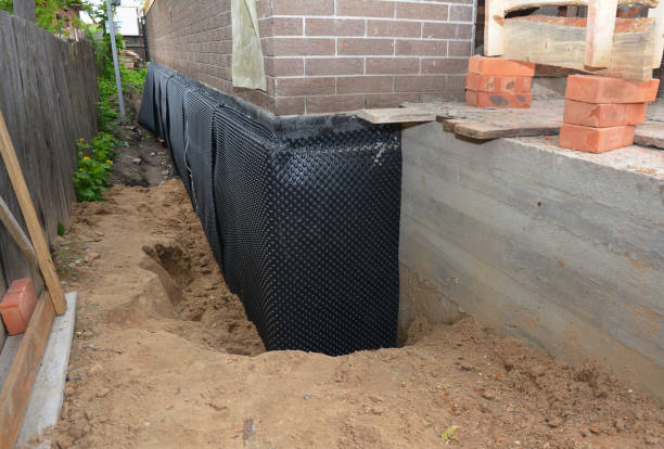 Happy homeowners after waterproofing job in Bordentown